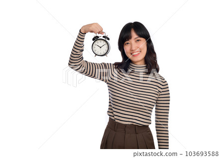 Happy Asian woman with casual clothing holding alarm clock isolated on white background 103693588