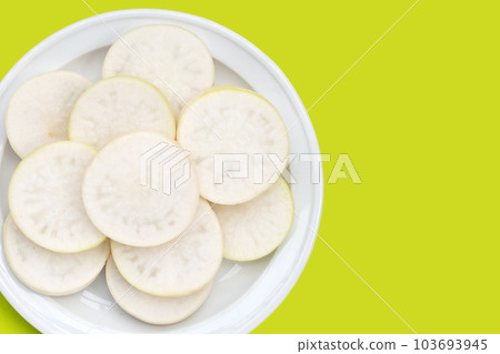 Sliced Japanese daikon. Fresh vegetables 103693945