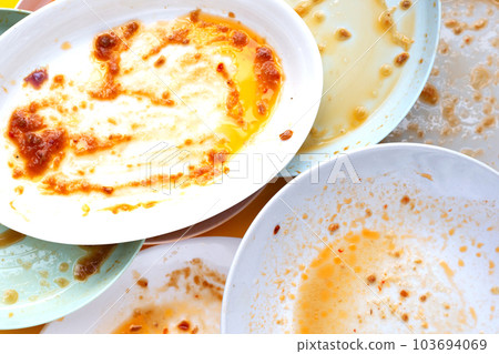 Dirty dishes on yellow background. Top view Dirty dishes on yellow background. Top view 103694069