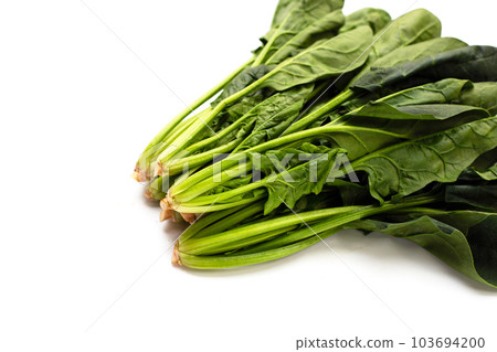 Fresh spinach on white background Fresh spinach on white background 103694200