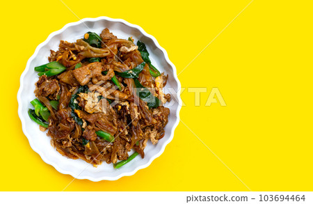 Stir-fried rice noodles with soy sauce and pork Stir-fried rice noodles with soy sauce and pork 103694464