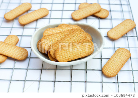 Biscuits on white background. Biscuits on white background. 103694478