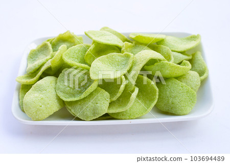 Prawn crackers on white background. Shrimp crispy rice snack  103694489