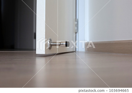 White door with door stopper 103694665