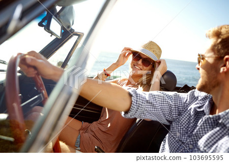 Car road trip, travel and driving couple on bonding holiday adventure, transportation journey or fun summer vacation. Love flare, convertible automobile and driver on Canada nature countryside tour Car road trip, travel and driving couple on bonding holiday adventure, transportation journey or fun summer vacation. Love flare, convertible automobile and driver on Canada nature countryside tour 103695595