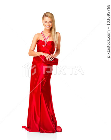 Fashion, glamour and elegant red dress on a confident woman looking happy about a prom party or fancy event against a copy space background. Bridesmaid gown or luxury designer wear and accessories 103695769