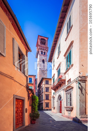 Lucca, Italy. Torre delle Ore, medieval clock tower in Tuscany. 103695790