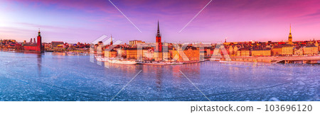 Stockholm, Sweden. Sunset over Gamla Stan and frozen Lake Malaren 103696120