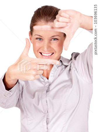 Hands, selfie and portrait of woman doing frame sign or gesture for a picture isolated in a white studio background. Young, focus and female person or employee framing her face with her finger border 103696135