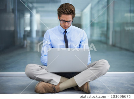 Laptop, sitting on floor and business man or entrepreneur developer typing code data at remote work. Information technology, research and professional person working on computer for virtual project 103696675