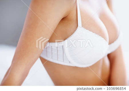 Closeup, sexy and lingerie with boobs of woman - Stock Photo