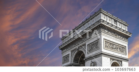 Arc de Triomphe (against the background of sky with clouds), Paris, France. The walls of the arch are engraved with the names of 128 battles and names of 660 French military leaders (in French) Arc de Triomphe (against the background of sky with clouds), Paris, France. The walls of the arch are engraved with the names of 128 battles and names of 660 French military leaders (in French) 103697663