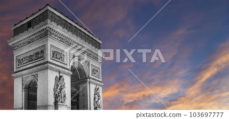 Arc de Triomphe (against the background of sky with clouds), Paris, France. The walls of the arch are engraved with the names of 128 battles and names of 660 French military leaders (in French) 103697777