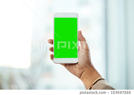 The smarter way of saying hello. an unrecognizable businesswoman using a mobile phone in her office. 103697888