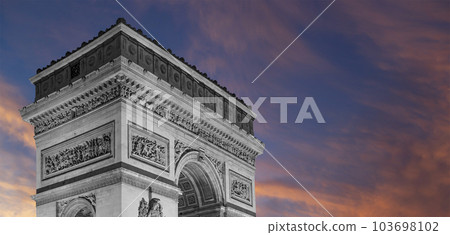 Arc de Triomphe (against the background of sky with clouds), Paris, France. The walls of the arch are engraved with the names of 128 battles and names of 660 French military leaders (in French) Arc de Triomphe (against the background of sky with clouds), Paris, France. The walls of the arch are engraved with the names of 128 battles and names of 660 French military leaders (in French) 103698102