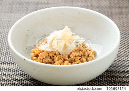 Natto. (Hikiwari natto with herring roe pickled in wasabi (Sankai pickled) topping). Natto. (Hikiwari natto with herring roe pickled in wasabi (Sankai pickled) topping). 103698154