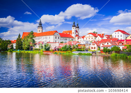 Telc, Czech Republic. Small city in Moravia, world heritage. Sunny day with white beautiful clouds. 103698414