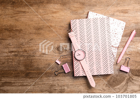 Flat lay composition with stylish notebooks on wooden table. Space for text Flat lay composition with stylish notebooks on wooden table. Space for text 103701805