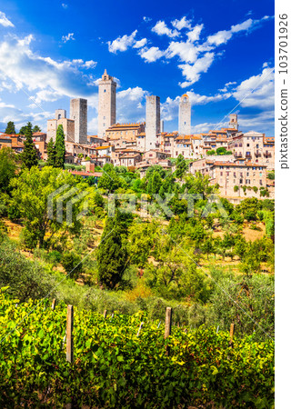 San Gimignano, Italy. Medieval Tuscan hill town with stunning towers and views. San Gimignano, Italy. Medieval Tuscan hill town with stunning towers and views. 103701926