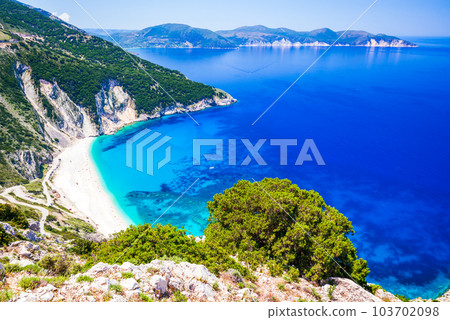 Kefalonia, Greece. Myrtos Beach - the most beautiful beach of the Cephalonia island, Greek Islands. Kefalonia, Greece. Myrtos Beach - the most beautiful beach of the Cephalonia island, Greek Islands. 103702098