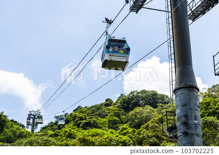 Maokong Gondola Cable car moving across the hills, It's a gondola lift transportation system in Taipei, Taiwan. 103702225