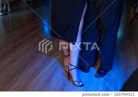 Feet of a couple of dancers Feet of a couple of dancers 103704521