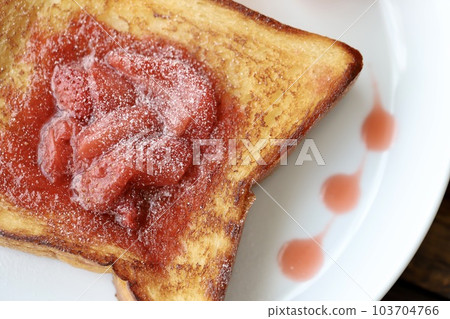 Toast arrangement with homemade strawberry sauce 103704766