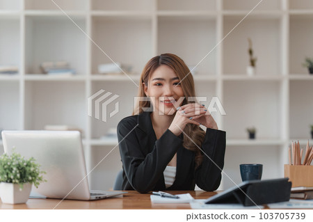 Accountant woman working on laptop and do document, tax, exchange, research, accounting and Financial advisor concept 103705739