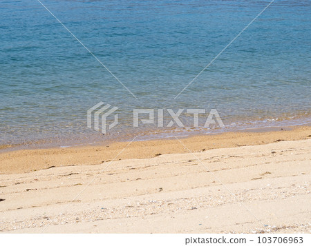The beach on the beach of the beautiful blue sea. The beach on the beach of the beautiful blue sea. 103706963