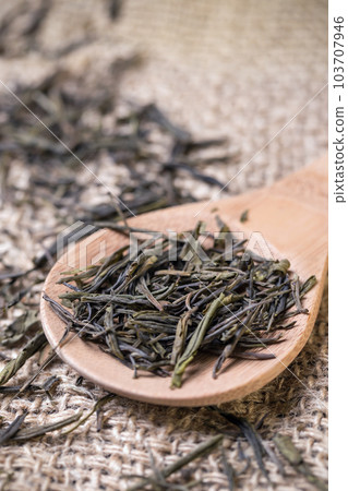 Spoon of dried green tea Spoon of dried green tea 103707946