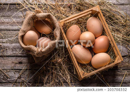 Fresh brown eggs 103708332