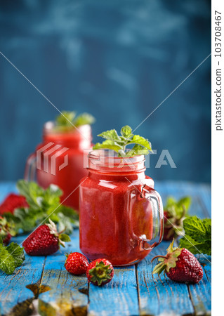 Strawberry smoothie in jars Strawberry smoothie in jars 103708467