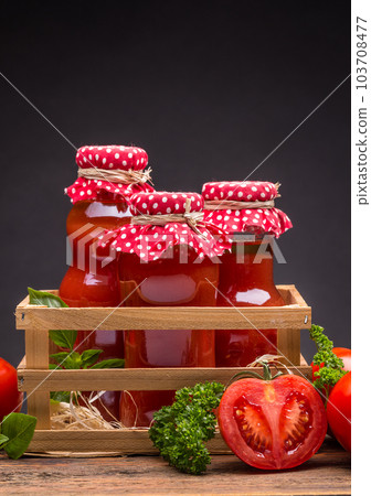 Bottles of tomato juice Bottles of tomato juice 103708477