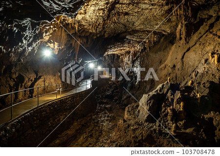 Cave with concrete footpath Cave with concrete footpath 103708478