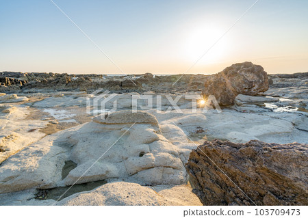 Cape Shiosezaki Reef area Strange rocks Strange stones Reflection Light Glittering water surface Cape Shiosezaki Reef area Strange rocks Strange stones Reflection Light Glittering water surface 103709473