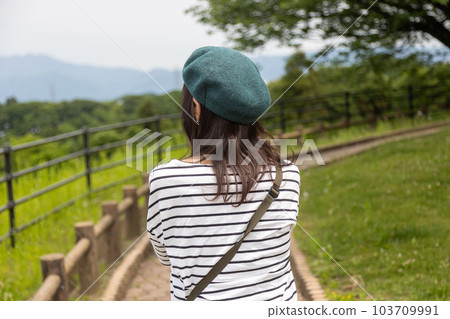 A person strolling through the park space in the Akagi Kogen Service Area 103709991