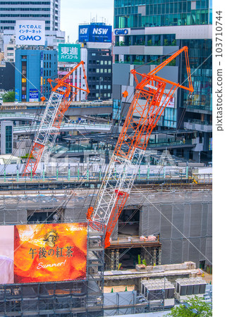 Tokyo cityscape in Japan June. One month after moving to Class 5... Large cranes line up at Shibuya Station... = 8th 103710744