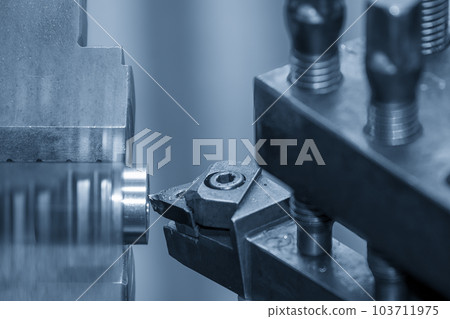 Closeup scene the lathe machine finish cut the metal parts. 103711975