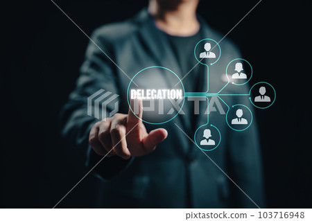 The manager delegates work to another person in the team, exemplifying the managerial concept of delegation and the effective distribution of tasks. 103716948