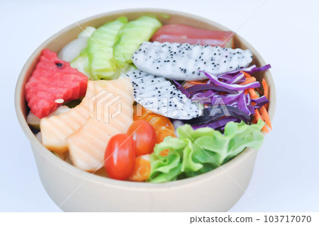 fruit and vegetable salad or cantaloupe, dragon fruit and lettuce salad 103717070