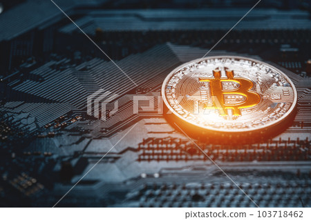 golden bitcoin cryptocurrency coin on electronic chip background 103718462