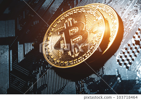 golden bitcoin cryptocurrency coin on electronic chip background golden bitcoin cryptocurrency coin on electronic chip background 103718464