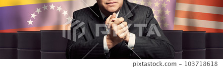 Politician or businessman on oil barrels background and background of Venezuela and America flags 103718618