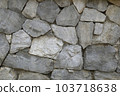 Stacked stones form a wall for a background or texture. 103718638