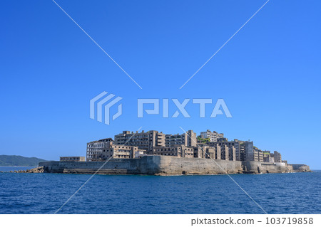 Gunkanjima (Hashima) and the blue sea and sky seen from the sea (close view) 103719858