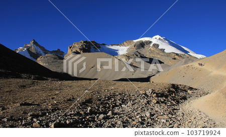 Thorong Ri and moraine, scene just below Thorong La pass, Nepal. Thorong Ri and moraine, scene just below Thorong La pass, Nepal. 103719924