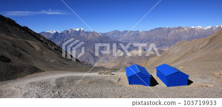 Shelter huts between Thorong La mountain pass and Muktinath, Nepal. 103719933