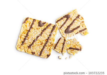 Puffed corn crackers chocolate covered isolated on white background. Puffed corn crackers chocolate covered isolated on white background. 103722235