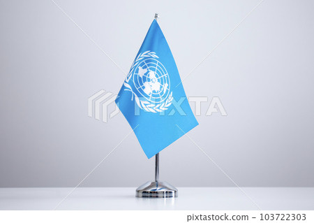 Flag of the United Nations on the table 103722303