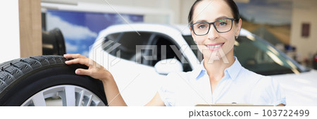 Female marketer making presentation of new tires Female marketer making presentation of new tires 103722499